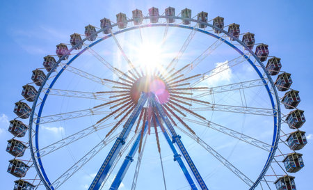 famous ferris wheel at the oktoberfest in munich - germanyのeditorial素材