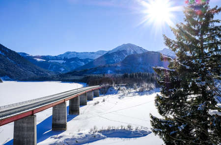 country road at the sylvenstein lake - bavariaの写真素材