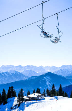 mountains with modern ski lift chairsの写真素材