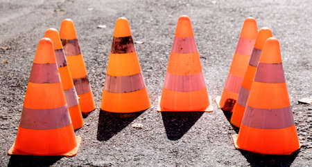 group of traffic cones at a street