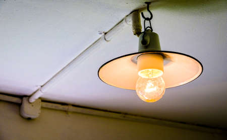 old lamp at the ceilingの写真素材
