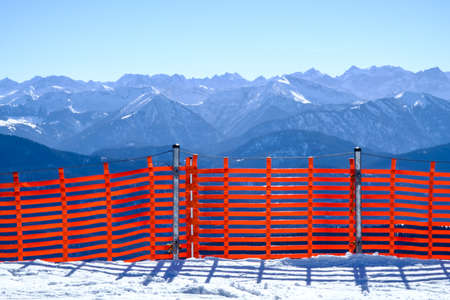 fence against snowdrift at the alpsの写真素材