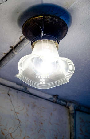 old lamp at the ceilingの写真素材