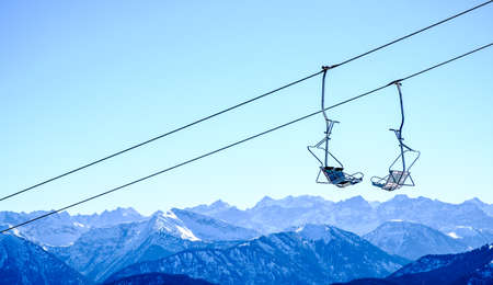 mountains with modern ski lift chairsの写真素材