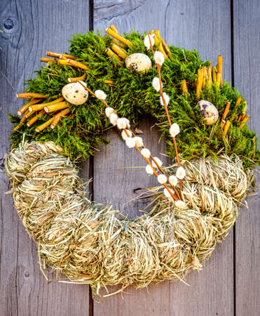 old wreath at a doorの写真素材