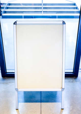 blank white board at a sidewalkの写真素材