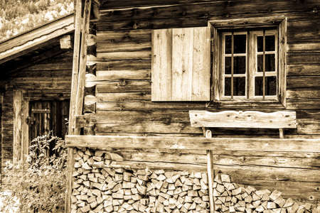 old window and firewoodの写真素材