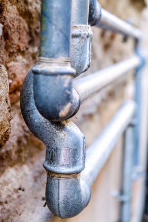 tubes at a facade - nice backgroundの写真素材