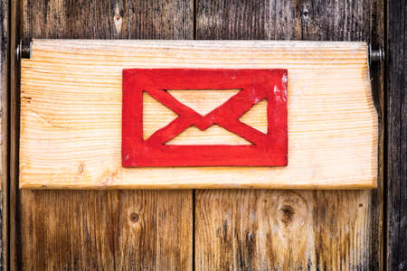 old letterbox at a historic facadeの写真素材
