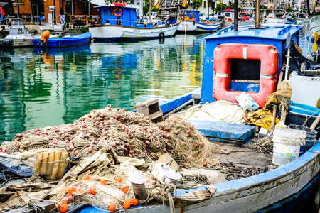old fishing boat at a harborの写真素材