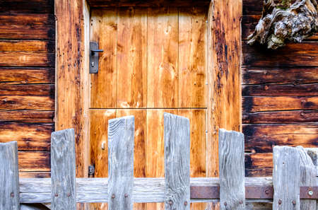 old wooden door at a hutの写真素材