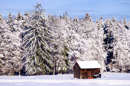 old house at the european alps in winterの写真素材