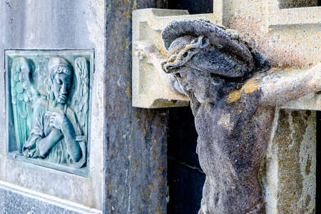 old cross at a cemeteryの写真素材