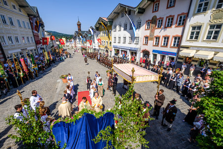 BAD TOELZ, GERMANY - JUNE 15 - People in traditional clothes at the Corpus Christi procession at June 15, 2017 in Bad Toelz - Germany.のeditorial素材