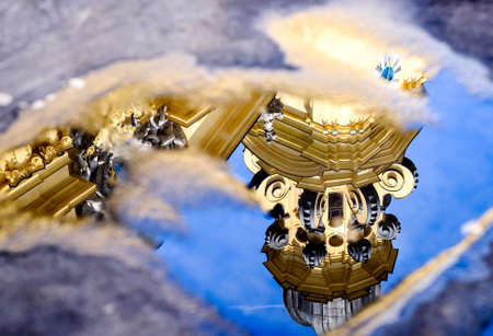 famous theatiner church in munich - reflection in a puddle - germanyの写真素材