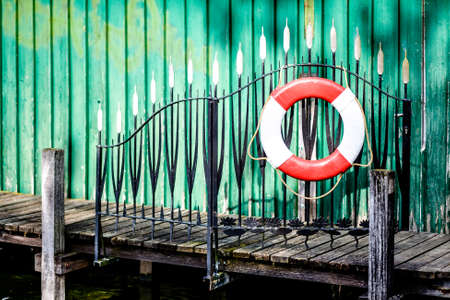 old lifebelt at a jettyの写真素材