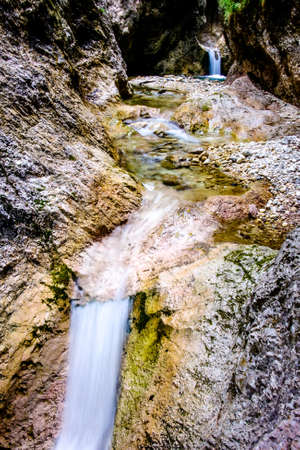 nice small waterfall at a forestの写真素材