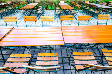 folding chairs at a typical bavarian beergardenの写真素材