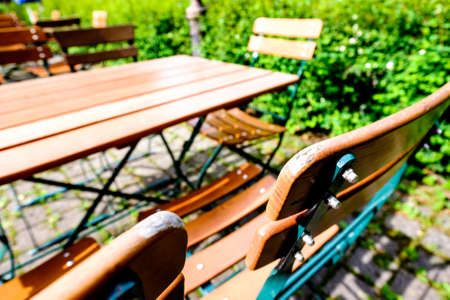 folding chairs at a typical bavarian beergardenの写真素材
