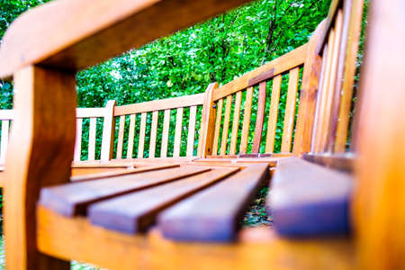 round parkbench at a sidewalkの写真素材