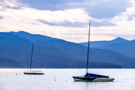 sailboats at the walchensee lake in germany - bavariaの写真素材