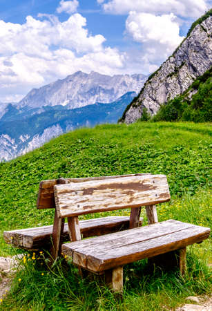 bench on the blomberg mountain in bavariaの写真素材