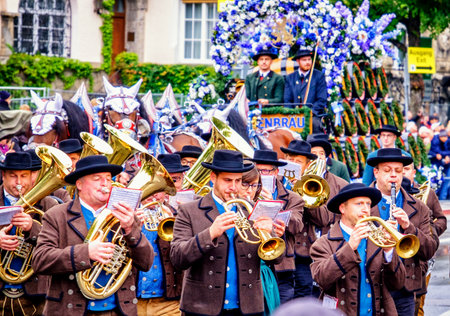 MUNICH, GERMANY - SEPTEMBER 16, 2017: The Oktoberfest is the world biggest beer festival and at the opening parade with rd. 9000 participants take part in historical costumes, music bands and horses.のeditorial素材