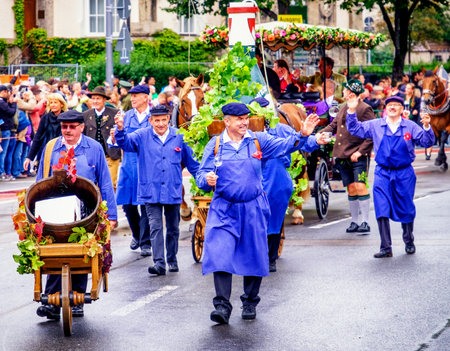 MUNICH, GERMANY - SEPTEMBER 16, 2017: The Oktoberfest is the world biggest beer festival and at the opening parade with rd. 9000 participants take part in historical costumes, music bands and horses.のeditorial素材