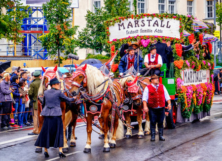 MUNICH, GERMANY - SEPTEMBER 16, 2017: The Oktoberfest is the world biggest beer festival and at the opening parade with rd. 9000 participants take part in historical costumes, music bands and horses.のeditorial素材