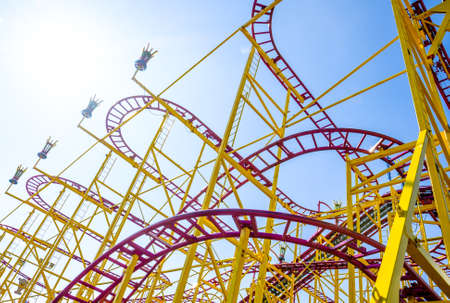 part of a roller coaster in front of blue skyの写真素材