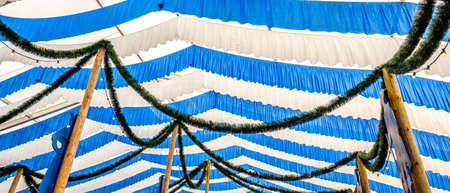 typical decoration at a oktoberfest tent in munich - germanyの写真素材