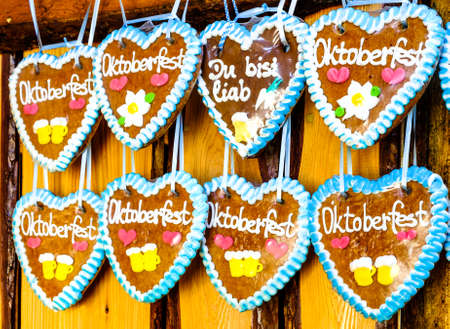 typical souvenir at the oktoberfest in munich - a gingerbread heart - lebkuchenherzの写真素材