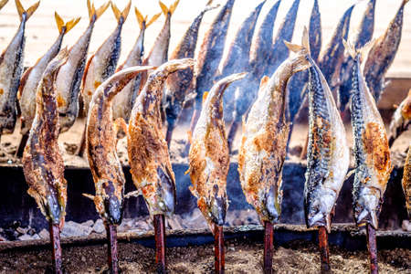 typical bavarian fish on a stick at the oktoberfest - germanyの写真素材