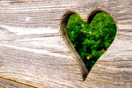 old wooden heart - closeup photoの写真素材