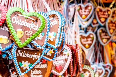 typical souvenir at the oktoberfest in munich - a gingerbread heart - lebkuchenherzの写真素材