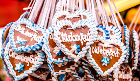 typical souvenir at the oktoberfest in munich - a gingerbread heart - lebkuchenherzの写真素材