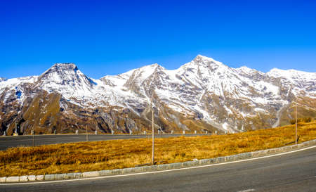 country road at the grossglockner mountainsの写真素材