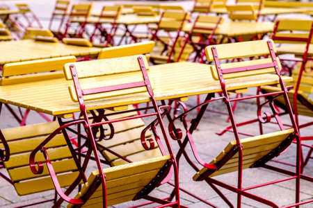 folding chairs at a beergardenの写真素材