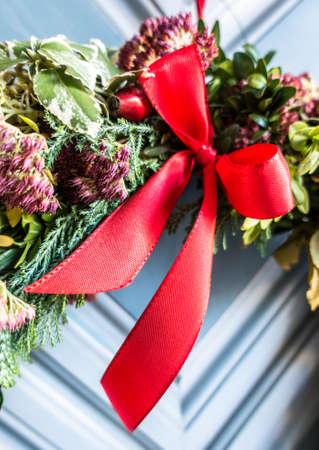 old wreath at a doorの写真素材