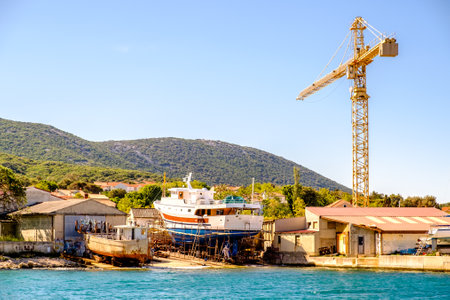 old boat at a harborのeditorial素材
