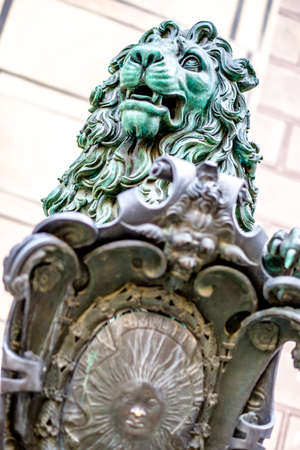 famous bavarian lion at the odeonsplatz in munichの写真素材