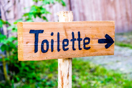 old restroom sign in germanyの写真素材