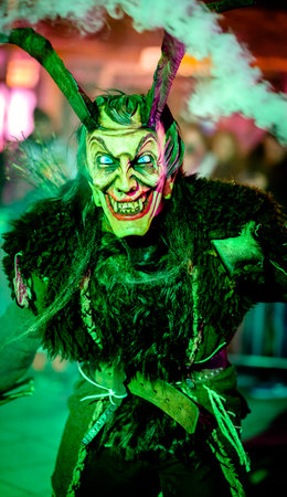 HEIMSTETTEN, GERMANY - DECEMBER 3: traditional krampuslauf with fantasy costumes and wooden masks on December 27, 2017 in Heimstetten, Germanyのeditorial素材