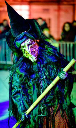 HEIMSTETTEN, GERMANY - DECEMBER 3: traditional krampuslauf with fantasy costumes and wooden masks on December 27, 2017 in Heimstetten, Germanyのeditorial素材