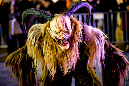 HEIMSTETTEN, GERMANY - DECEMBER 3: traditional krampuslauf with fantasy costumes and wooden masks on...