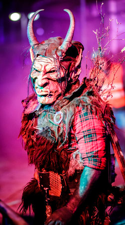 HEIMSTETTEN, GERMANY - DECEMBER 3: traditional krampuslauf with fantasy costumes and wooden masks on...