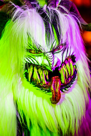 HEIMSTETTEN, GERMANY - DECEMBER 3: traditional krampuslauf with fantasy costumes and wooden masks on...