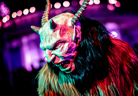 HEIMSTETTEN, GERMANY - DECEMBER 3: traditional krampuslauf with fantasy costumes and wooden masks on December 27, 2017 in Heimstetten, Germanyのeditorial素材