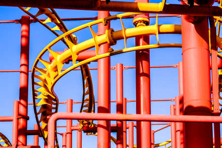 part of a roller coaster in front of blue skyの写真素材