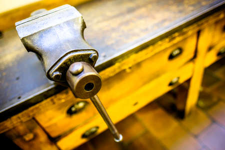 old bench vise at a workshopの写真素材